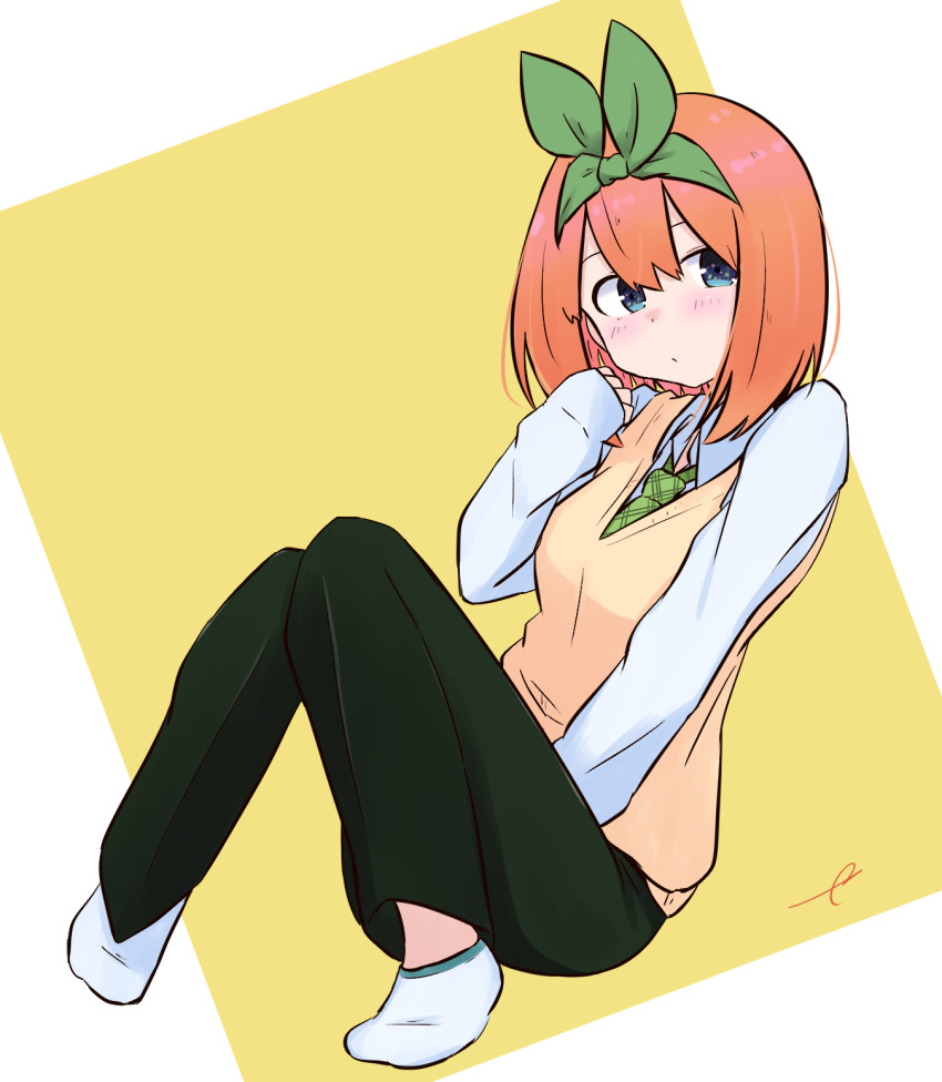 1girl ankle_socks bangs blue_eyes blush breasts closed_mouth collared_shirt commentary_request eyebrows_behind_hair full_body go-toubun_no_hanayome green_neckwear green_pants green_ribbon hair_between_eyes hair_ribbon hand_up highres knees_together_feet_apart knees_up kujou_karasuma long_sleeves looking_at_viewer nakano_yotsuba necktie orange_hair pants plaid_neckwear ribbon shirt signature sleeves_past_wrists small_breasts solo sweater_vest two-tone_background white_background white_legwear white_shirt yellow_background