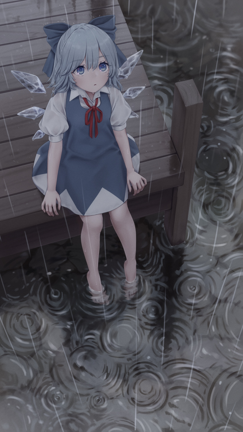 1girl barefoot blue_bow blue_dress blue_eyes blue_hair bow cirno dress eyebrows_visible_through_hair hair_bow highres ice ice_wings neck_ribbon parted_lips pier puffy_short_sleeves puffy_sleeves rain red_neckwear ribbon short_sleeves sitting soaking_feet solo torinari_(dtvisu) touhou water wet wet_hair wings