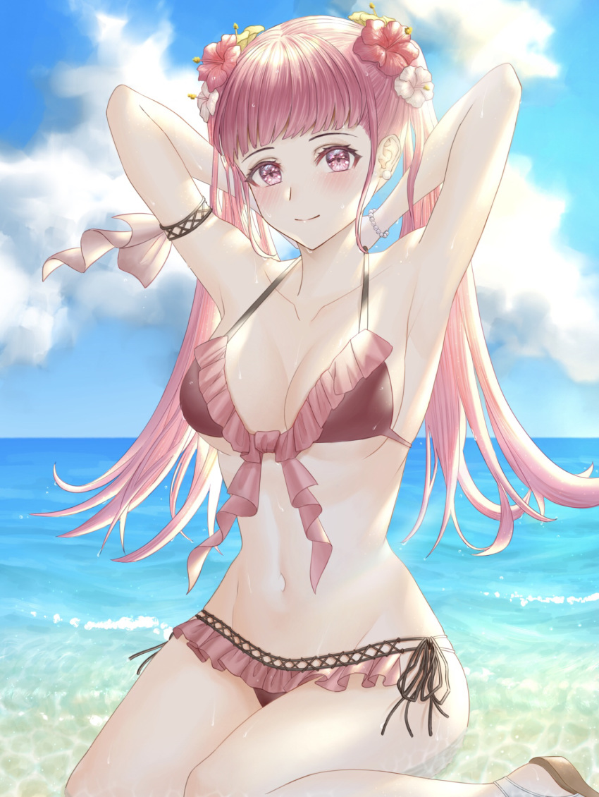 1girl arms_up beach bikini blue_sky closed_mouth clouds day fire_emblem fire_emblem:_three_houses flower hair_flower hair_ornament highres hilda_valentine_goneril long_hair outdoors pink_eyes pink_hair sitting sky smile solo swimsuit twintails uni_(uni9248) water