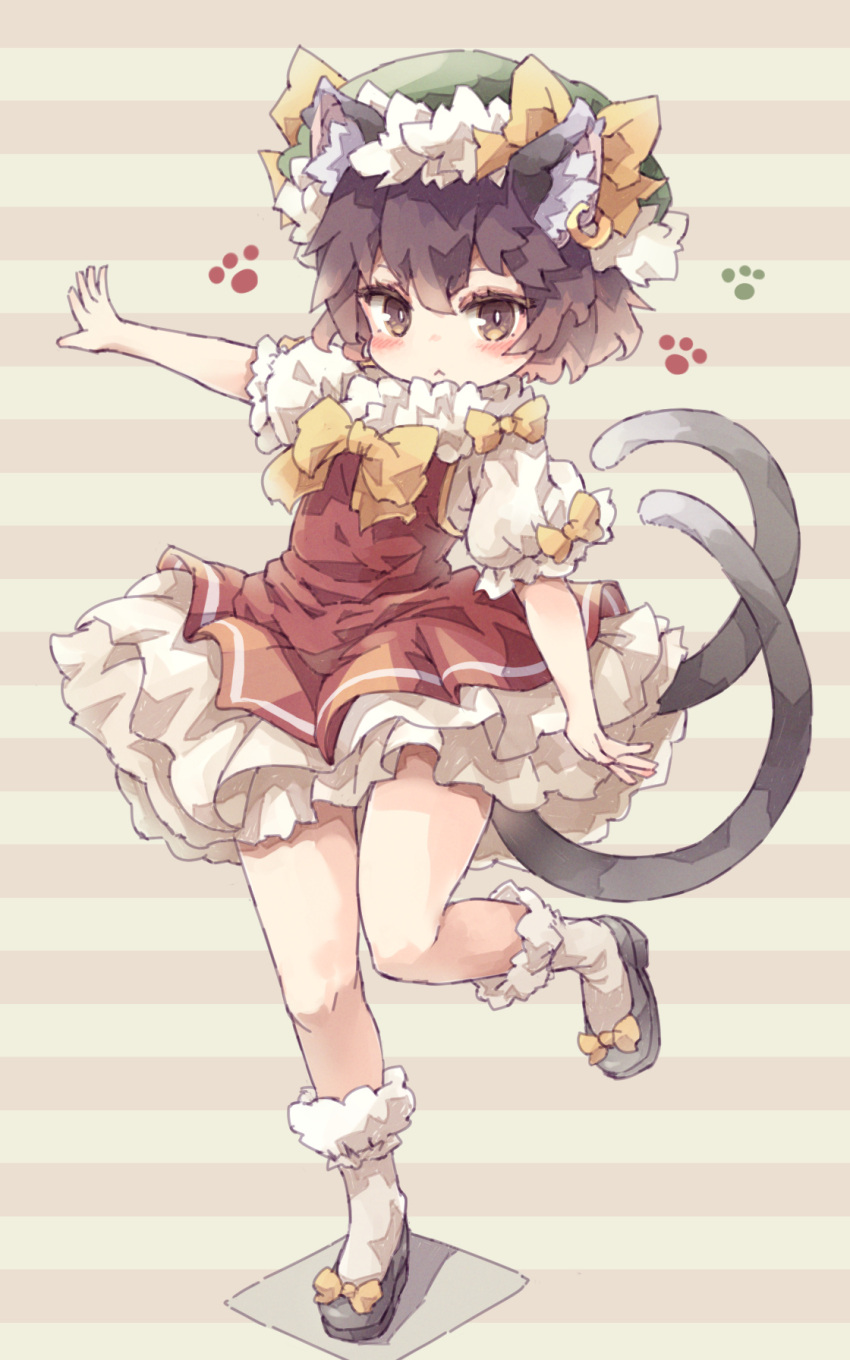 1girl :&lt; animal_ears bangs black_footwear bow bright_pupils brown_background brown_eyes brown_hair cat_ears cat_tail chen closed_mouth dress earrings footwear_bow frilled_dress frills full_body green_headwear hat highres jewelry kolshica looking_at_viewer mob_cap multiple_tails nekomata paw_print red_dress short_hair short_sleeves single_earring solo standing standing_on_one_leg striped striped_background tail touhou two_tails white_legwear white_pupils yellow_bow