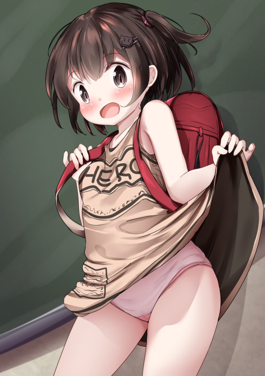1girl backpack bag bare_arms bare_shoulders blush breasts brown_dress brown_eyes brown_hair cat_hair_ornament chalkboard clothes_writing commentary_request dress dress_lift hair_ornament hairclip highres lifted_by_self looking_at_viewer mochiyuki one_side_up open_mouth original panties randoseru sleeveless sleeveless_dress small_breasts solo standing underwear white_panties