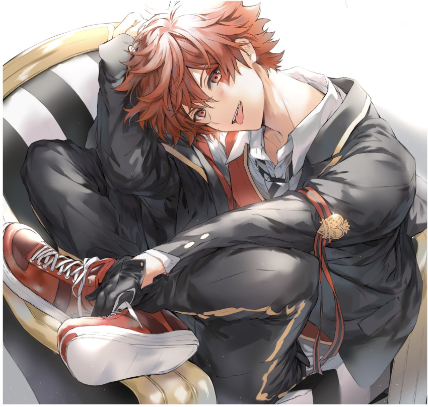 1boy ace_trappola black_gloves chair facial_tattoo gloves hair_between_eyes highres jacket looking_at_viewer male_focus necktie open_mouth orange_hair red_eyes redhead school_uniform shoes short_hair sitting smile sneakers tattoo tongue tongue_out twisted_wonderland twst_aaa