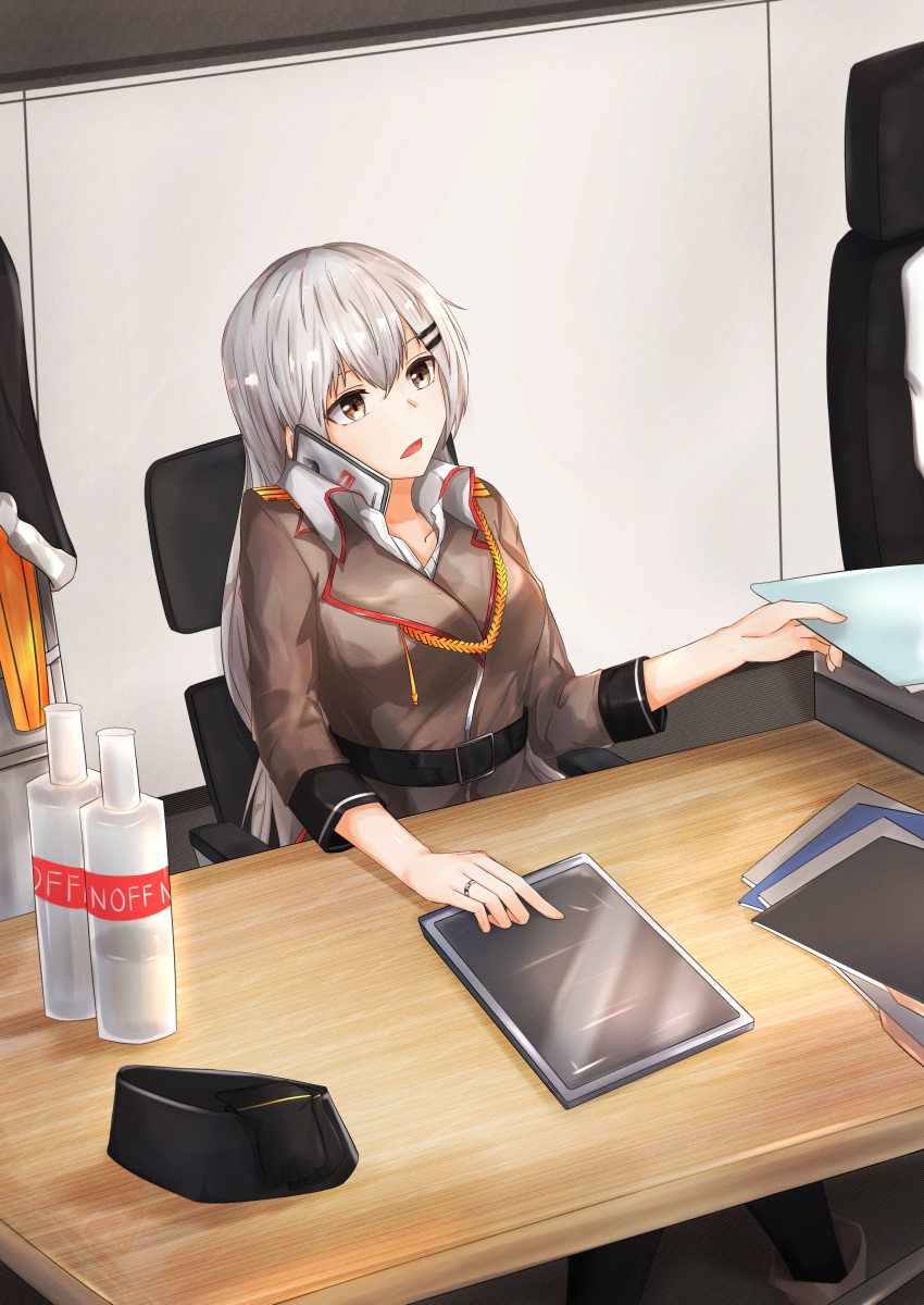 1girl absurdres belt black_belt breasts brown_jacket cellphone chair eyebrows_visible_through_hair girls_frontline grey_eyes grey_hair hat hat_removed headwear_removed highres huge_filesize jacket jewelry long_hair looking_away medium_breasts military military_hat military_uniform muteppona_hito office office_chair open_mouth paper phone ring shirt smartphone smirnoff_(vodka) solo svd_(girls_frontline) table tablet_pc talking_on_phone uniform white_shirt