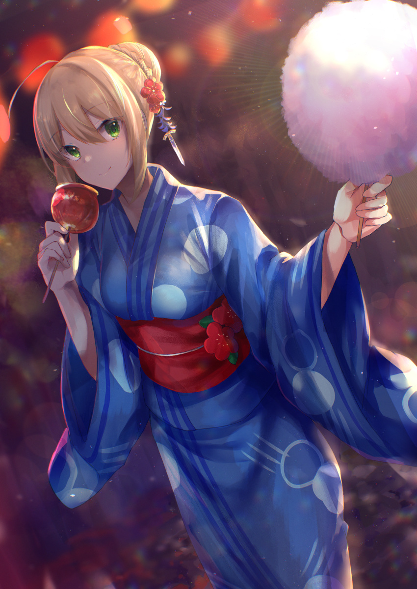 1girl absurdres ahoge artoria_pendragon_(all) bangs blue_kimono blurry blurry_background braid candy_apple closed_mouth cotton_candy depth_of_field eyebrows_visible_through_hair fate/stay_night fate_(series) feet_out_of_frame flower food green_eyes hair_between_eyes hair_bun hair_flower hair_ornament highres hitomin_(ksws7544) holding holding_food huge_filesize japanese_clothes kimono lens_flare long_sleeves looking_at_viewer obi outdoors red_flower sash smile solo standing wide_sleeves yukata