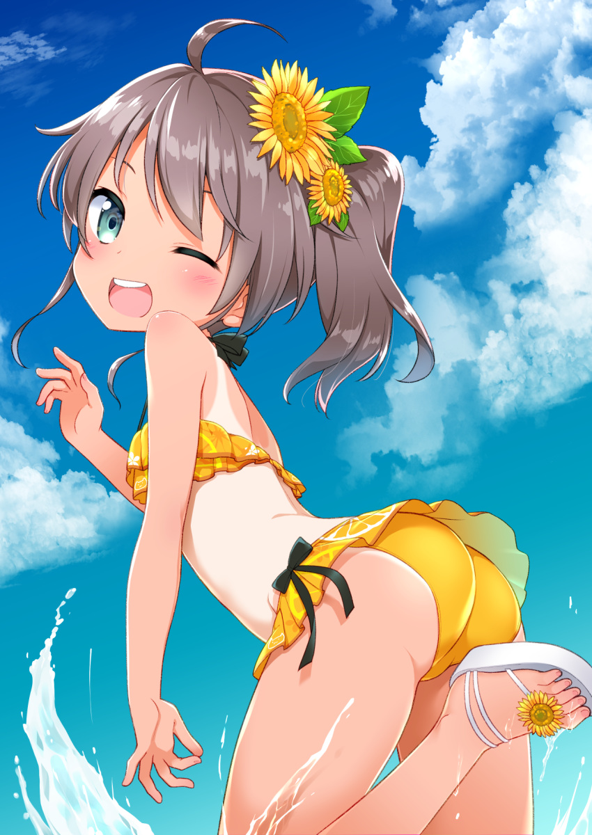 1girl ;d ahoge ass back bangs bikini black_bow blue_eyes blue_sky blush bow brown_hair clouds day flower hair_flower hair_ornament halter_top halterneck highres hololive kannazuki_genshi long_hair looking_at_viewer looking_back natsuiro_matsuri one-piece_tan one_eye_closed open_mouth outdoors sandals side_ponytail sky smile solo sunflower swimsuit tan tanline upper_teeth virtual_youtuber water yellow_bikini