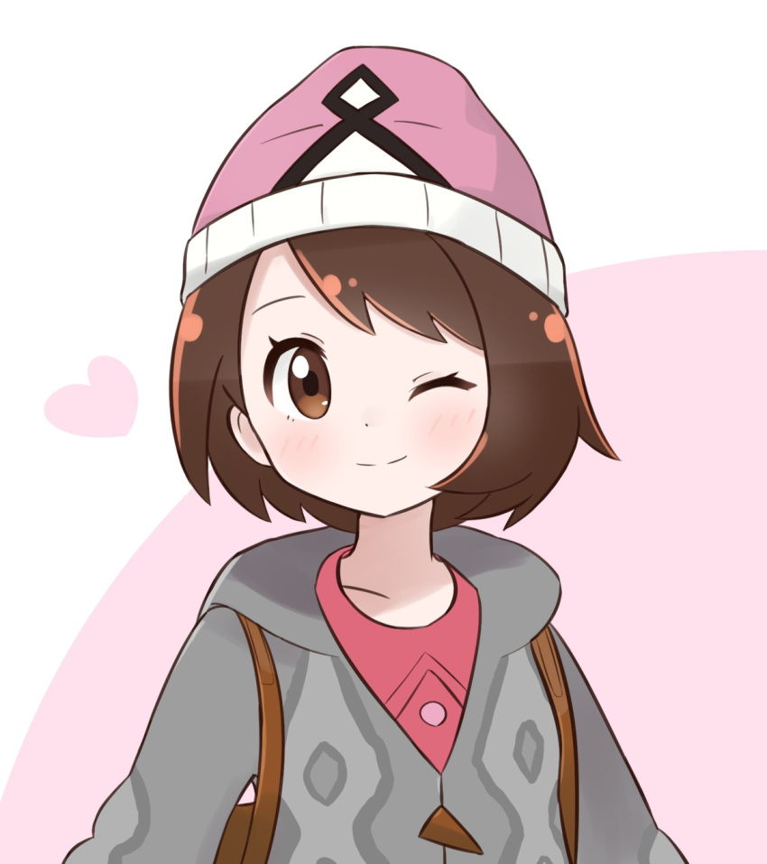 1girl ;) backpack bag beanie blush bob_cut brown_eyes brown_hair cardigan closed_mouth commentary gen_7_pokemon grey_cardigan hat heart highres hooded_cardigan ixia_(ixia424) legendary_pokemon looking_at_viewer one_eye_closed pink_background pink_headwear pink_shirt pokemon pokemon_(game) pokemon_swsh shirt short_hair smile solo tapu_lele themed_object two-tone_background upper_body white_background yuuri_(pokemon)