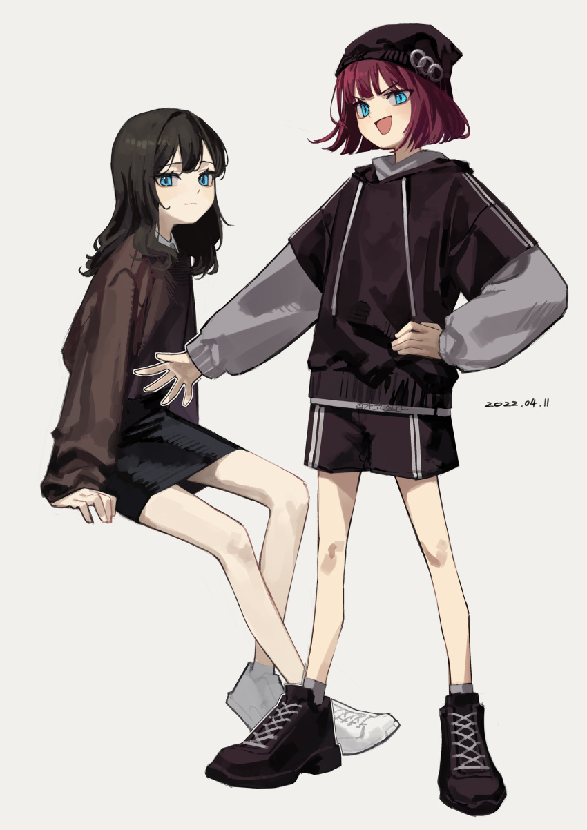 2girls absurdres bare_legs beanie black_footwear black_hair black_headwear black_hoodie black_shorts black_skirt blue_eyes brown_sweater closed_mouth commentary dated drawstring grey_background grey_legwear hat highres hood hoodie long_hair long_sleeves multiple_girls open_mouth original pencil_skirt redhead shoes short_hair shorts simple_background sitting skirt smile sneakers socks standing sweater white_footwear yoon_cook