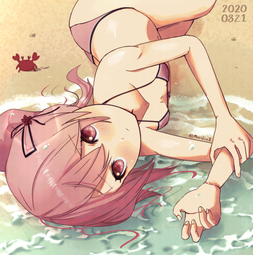 1girl beach bikini breasts cowboy_shot crab flower hair_flower hair_ornament harusame_(kantai_collection) highres kantai_collection looking_at_viewer lying maridix on_side pink_bikini pink_hair red_eyes ribbon sand side_ponytail small_breasts smile solo swimsuit waves