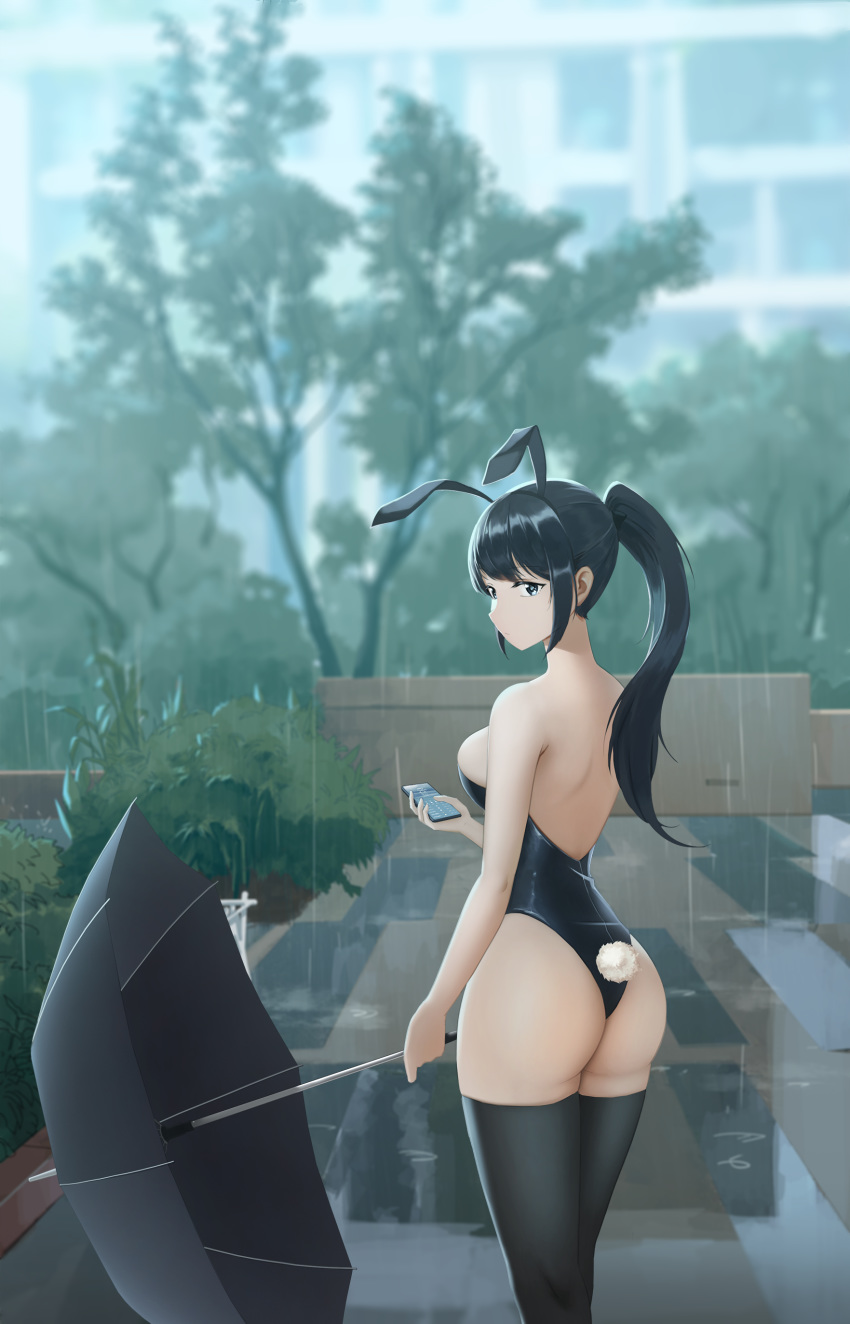 1girl absurdres animal_ears ass back bangs bare_arms bare_shoulders black_hair black_legwear black_umbrella blurry blurry_background blush breasts bunny_tail bunnysuit bush closed_mouth commentary_request cowboy_shot fake_animal_ears fake_tail from_behind gan-viking highres holding holding_phone holding_umbrella large_breasts leotard long_hair looking_at_viewer looking_back original outdoors phone ponytail rabbit_ears rain skindentation solo standing strapless strapless_leotard tail thigh-highs thighs tree umbrella water wrist_cuffs