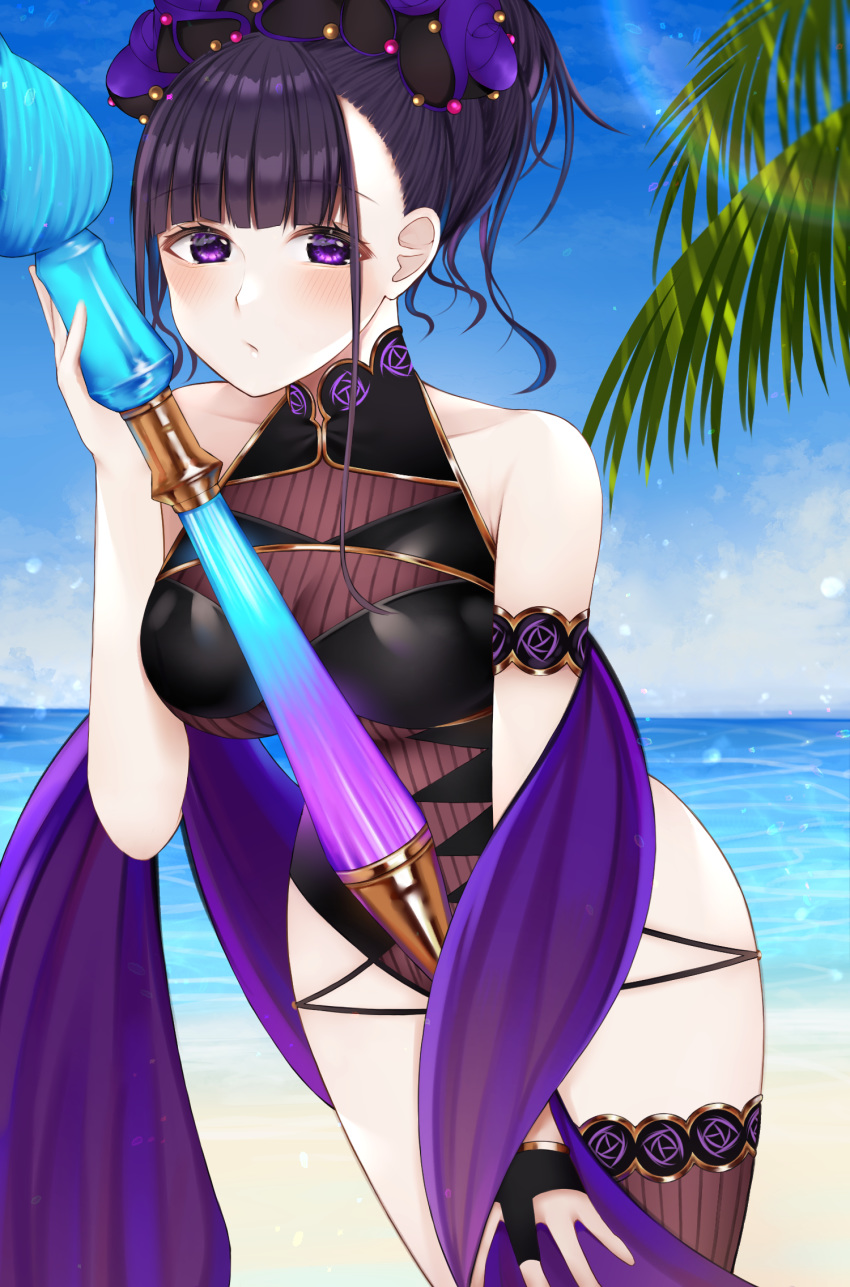 1girl armlet bangs bare_shoulders beach black_swimsuit blue_sky blush breasts closed_mouth fate/grand_order fate_(series) flower hair_flower hair_ornament hair_up highleg highleg_swimsuit highres large_breasts long_hair looking_at_viewer murasaki_shikibu_(fate) murasaki_shikibu_(swimsuit_rider)_(fate) nerua one-piece_swimsuit oversized_object palm_tree pen purple_hair shawl shore single_thighhigh sky swimsuit thigh-highs thighs tied_hair tree violet_eyes