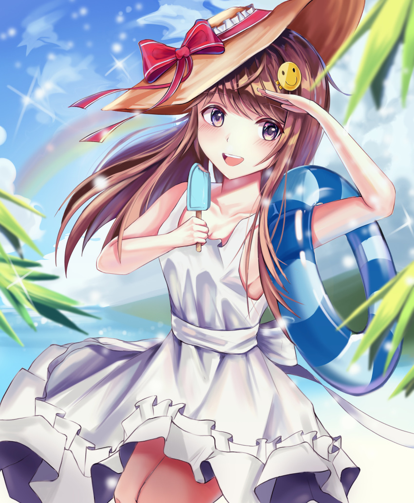 1girl :d absurdres bangs bare_shoulders blurry blurry_background blurry_foreground breasts brown_eyes brown_hair candy clouds cloudy_sky collarbone commentary_request day depth_of_field dress emoji eyebrows_visible_through_hair food frilled_dress frills hair_ornament hairclip hat hat_ribbon highres holding holding_candy holding_food holding_innertube ice_cream innertube long_hair looking_at_viewer ocean open_mouth original outdoors palm_leaf popsicle red_ribbon ribbon sky small_breasts smile solo striped summer sun_hat sundress tobi_(user45255077) white_dress