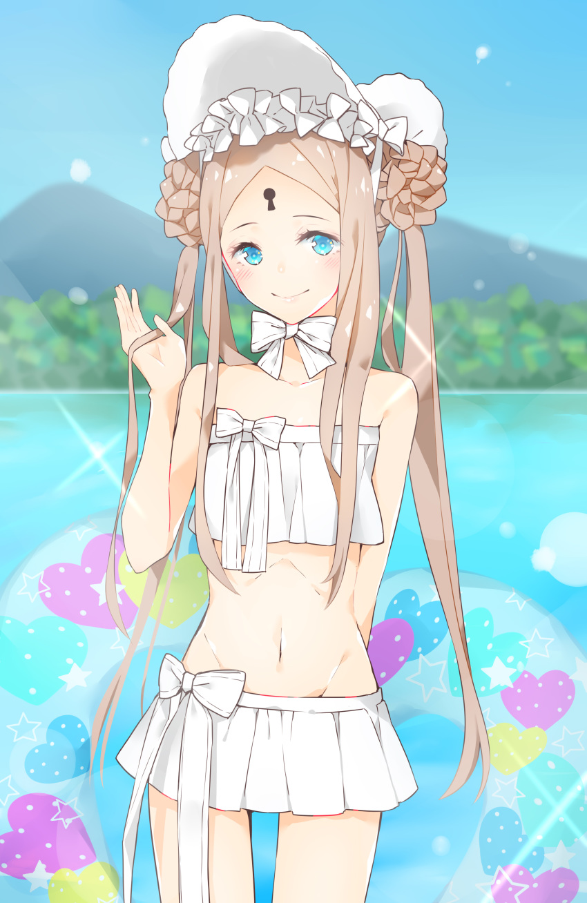 1girl abigail_williams_(fate/grand_order) abigail_williams_(swimsuit_foreigner)_(fate) absurdres bangs bare_shoulders bikini blonde_hair blue_eyes blue_sky blurry blurry_background blush bonnet bow braid braided_bun breasts closed_mouth double_bun fate/grand_order fate_(series) forehead hair_bow highres innertube keyhole lake long_hair looking_at_viewer miniskirt navel nemuko_ofuton parted_bangs sidelocks skirt sky small_breasts smile sparkle swimsuit thighs twintails very_long_hair white_bikini white_bow white_headwear