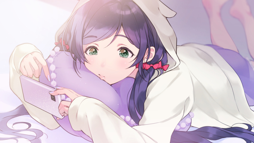1girl animal_hood blurry blurry_background bow cellphone commentary_request feet_up fingernails green_eyes hair_bow holding holding_phone hood hood_up kate_iwana lips long_hair long_sleeves love_live! love_live!_school_idol_project lying nail_polish on_stomach pajamas phone pillow purple_hair purple_nails red_bow smartphone solo toujou_nozomi twintails white_hoodie