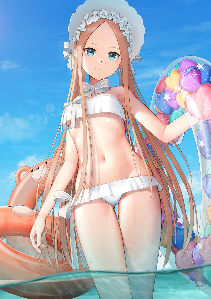 1girl abigail_williams_(fate/grand_order) abigail_williams_(swimsuit_foreigner)_(fate) bangs bare_shoulders bikini blonde_hair blue_eyes blue_sky bonnet bow breasts closed_mouth fate/grand_order fate_(series) forehead hair_bow highres innertube kep_(ahokep) long_hair looking_at_viewer miniskirt navel ocean parted_bangs sidelocks skirt sky small_breasts smile swimsuit thighs twintails very_long_hair wading wet white_bikini white_bow white_headwear