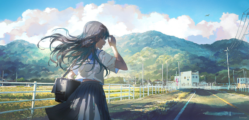 1girl arm_up bag bird black_bag black_hair black_skirt blue_sky building clouds cloudy_sky commentary commentary_request cowboy_shot day fence floating_hair from_behind highres long_hair mountain nagakura_(seven_walkers) original outdoors pleated_skirt power_lines road scenery school_bag school_uniform serafuku shirt short_sleeves skirt sky solo white_shirt wind