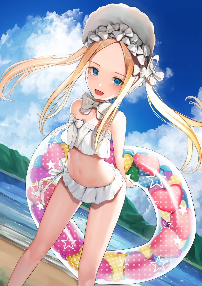 1girl :d abigail_williams_(swimsuit_foreigner)_(fate) absurdres arms_behind_back bangs bare_arms bare_shoulders beach bent_over bikini blonde_hair blue_eyes blue_sky blush bow breasts clouds collarbone day dutch_angle fate/grand_order fate_(series) flat_chest food forehead hair_bow hair_ornament hat highres holding innertube long_hair looking_at_viewer multiple_bows navel ocean open_mouth outdoors parted_bangs sidelocks sky smile solo sunga2usagi swimsuit twintails very_long_hair water white_bikini white_bow