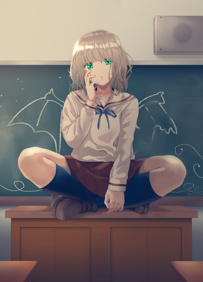 1girl absurdres black_legwear blonde_hair chalkboard classroom commentary desk green_eyes highres indoors kneehighs lotus_position on_desk original raku_rakugaki sailor_collar school_uniform sitting sitting_on_desk solo wings