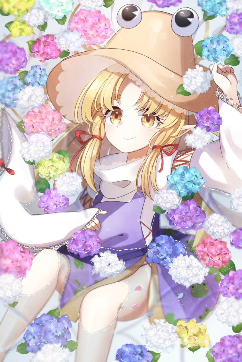 1girl ametama_(runarunaruta5656) animal_print arm_up bangs bare_legs blonde_hair cross-laced_top detached_sleeves eyebrows_visible_through_hair eyelashes flower frog_print hair_ribbon hand_on_own_stomach hat highres hydrangea long_hair long_sleeves looking_at_viewer moriya_suwako parted_bangs partially_immersed partially_submerged pointy_ears purple_skirt purple_vest red_ribbon ribbon shirt skirt skirt_set sleeves_past_wrists smile solo touhou vest white_shirt wide_sleeves