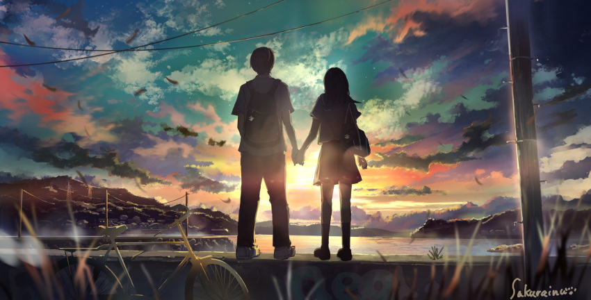 1boy 1girl absurdres artist_name backpack bag bag_charm bicycle black_hair bookbag charm_(object) clouds from_behind ground_vehicle highres holding_hands kneehighs mountainous_horizon original outdoors power_lines puzzle_piece sakura_inu_(itoyatomo) scenery shirt shoes skirt sneakers standing summer sunset t-shirt telephone_pole
