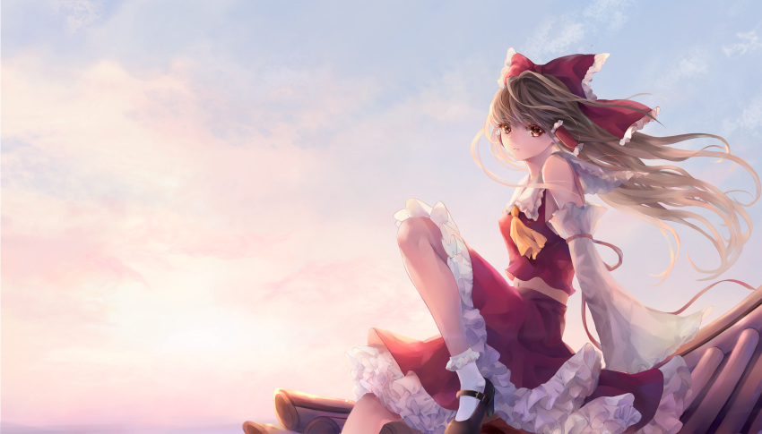1girl absurdres ascot bangs bare_shoulders bow brown_hair collared_shirt detached_sleeves feet_out_of_frame floating_hair frilled_legwear frilled_shirt_collar frilled_skirt frills hair_bow hair_tubes hakurei_reimu highres leg_up long_hair looking_at_viewer mary_janes midriff_peek navel open_mouth red_eyes rooftop shirt shoes sitting skirt sky sleeve_ribbon sleeveless sleeveless_shirt socks solo touhou tuanz white_legwear wind yellow_neckwear