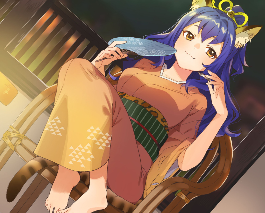 1girl :3 anchovy_(fish) animal_ears barefoot bell blue_hair brown_eyes buuta cat_ears cat_tail chair dutch_angle fan hair_ribbon highres indoors japanese_clothes jingle_bell kimono long_hair looking_at_viewer necogurashi official_art orange_kimono paper_fan ribbon sitting smile solo tail uchiwa wide_sleeves yellow_ribbon