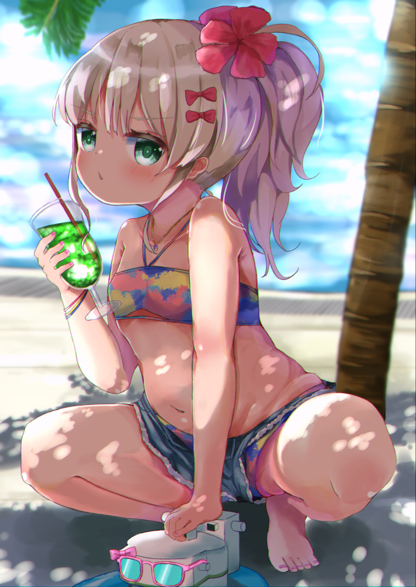 1girl bare_arms bare_legs bare_shoulders barefoot bikini bikini_under_clothes blue_shorts blurry blurry_background blush bow breasts collarbone commentary_request cup depth_of_field drinking_glass drinking_straw flower grecale_(kantai_collection) green_eyes hair_bow hair_flower hair_ornament halter_top halterneck highres holding holding_cup kantai_collection long_hair mugichoko_(mugi_no_choko) navel parted_lips pink-framed_eyewear ponytail red_bow red_flower short_shorts shorts silver_hair small_breasts solo spread_legs squatting sunglasses swimsuit tree