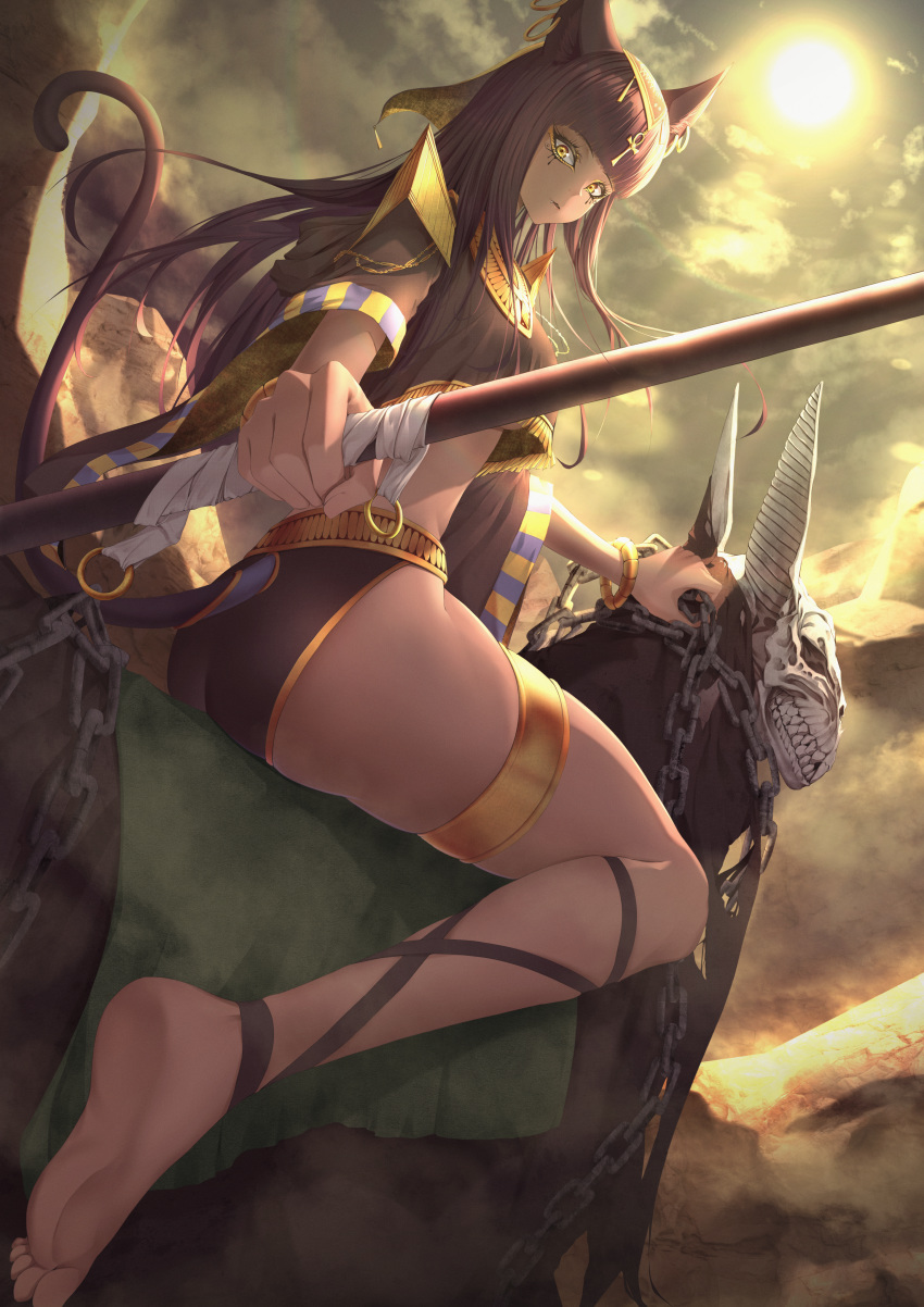 1girl absurdres animal_ears ankh barefoot bracelet brown_hair cat_ears cat_tail chain dark_skin desert earrings egyptian english_commentary fang gold gold_trim highres holding holding_staff huge_filesize jewelry long_hair looking_at_viewer midriff myuryuneko original skull staff sun tail thighlet yellow_eyes