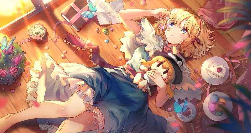 1girl absurdres alice_margatroid bare_legs blonde_hair blue_dress blue_eyes blush book bug butterfly cake cake_slice candy capelet character_doll commentary_request cup dress elise_(piclic) emerald_(gemstone) feet_out_of_frame flower food frilled_dress frills gem hairband highres holding indoors insect kirisame_marisa lying macaron on_back on_floor parted_lips petals pink_flower pink_rose plate puffy_short_sleeves puffy_sleeves red_hairband rose rose_petals ruby_(gemstone) sapphire_(gemstone) short_hair short_sleeves solo tea teacup touhou white_capelet wooden_floor yin_yang