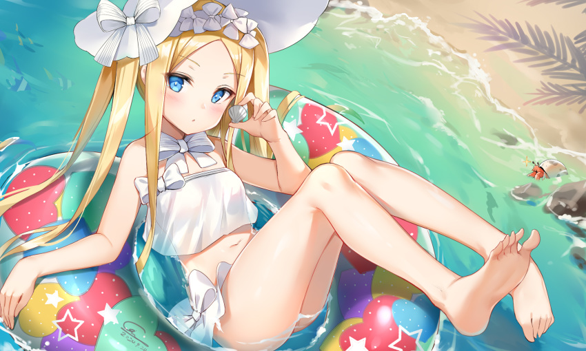 1girl :o abigail_williams_(fate/grand_order) abigail_williams_(swimsuit_foreigner)_(fate) barefoot beach bikini blonde_hair blue_eyes bonnet dated fate/grand_order fate_(series) frilled_bikini frills full_body ginn_(hzh770121) highres legs long_hair looking_at_viewer navel sand shell signature soles solo swimsuit water white_bikini