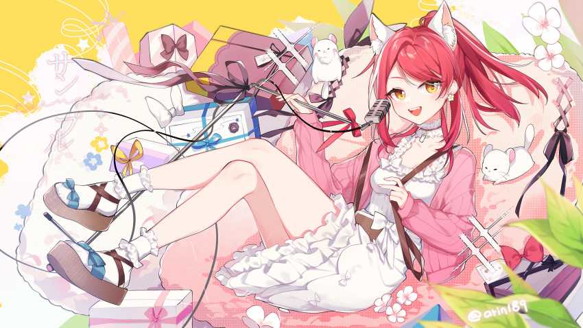 1girl :d alternate_hairstyle animal_ear_fluff animal_ears arin_(fanfan013) bangs blurry box brown_eyes cardigan cat_ears commentary_request creature crossed_legs depth_of_field detached_collar dress earrings flower flower_earrings full_body gift gift_box highres hololive hololive_china jewelry long_sleeves looking_at_viewer microphone mixed-language_commentary open_cardigan open_clothes open_mouth pink_cardigan plant ponytail redhead sandals sitting smile swept_bangs symbol_commentary twitter_username white_dress white_legwear yogiri_(hololive)