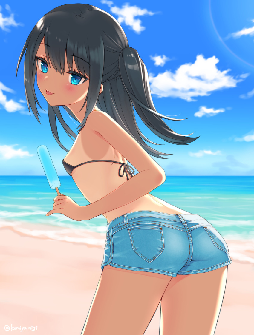 :p ass beach bikini bikini_top black_bikini black_hair blue_eyes breasts clouds commentary_request denim denim_shorts food from_behind highres komiya_nigi leaning_forward long_hair looking_back ocean one-piece_tan original outdoors popsicle short_shorts shorts sideboob sky small_breasts smile swimsuit tan tanline thighs tongue tongue_out two_side_up