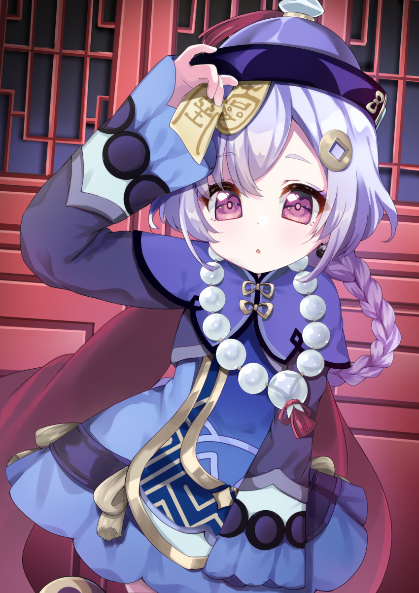 1girl :o absurdres arm_up bangs bead_necklace beads blue_dress blush braid commentary_request dress eyebrows_visible_through_hair genshin_impact hair_between_eyes hair_ornament hat highres jewelry jiangshi long_hair long_sleeves looking_at_viewer necklace ofuda parted_bangs parted_lips purple_capelet purple_hair purple_headwear qing_guanmao qiqi sleeves_past_wrists solo standing suzu_(minagi) talisman very_long_hair violet_eyes wide_sleeves