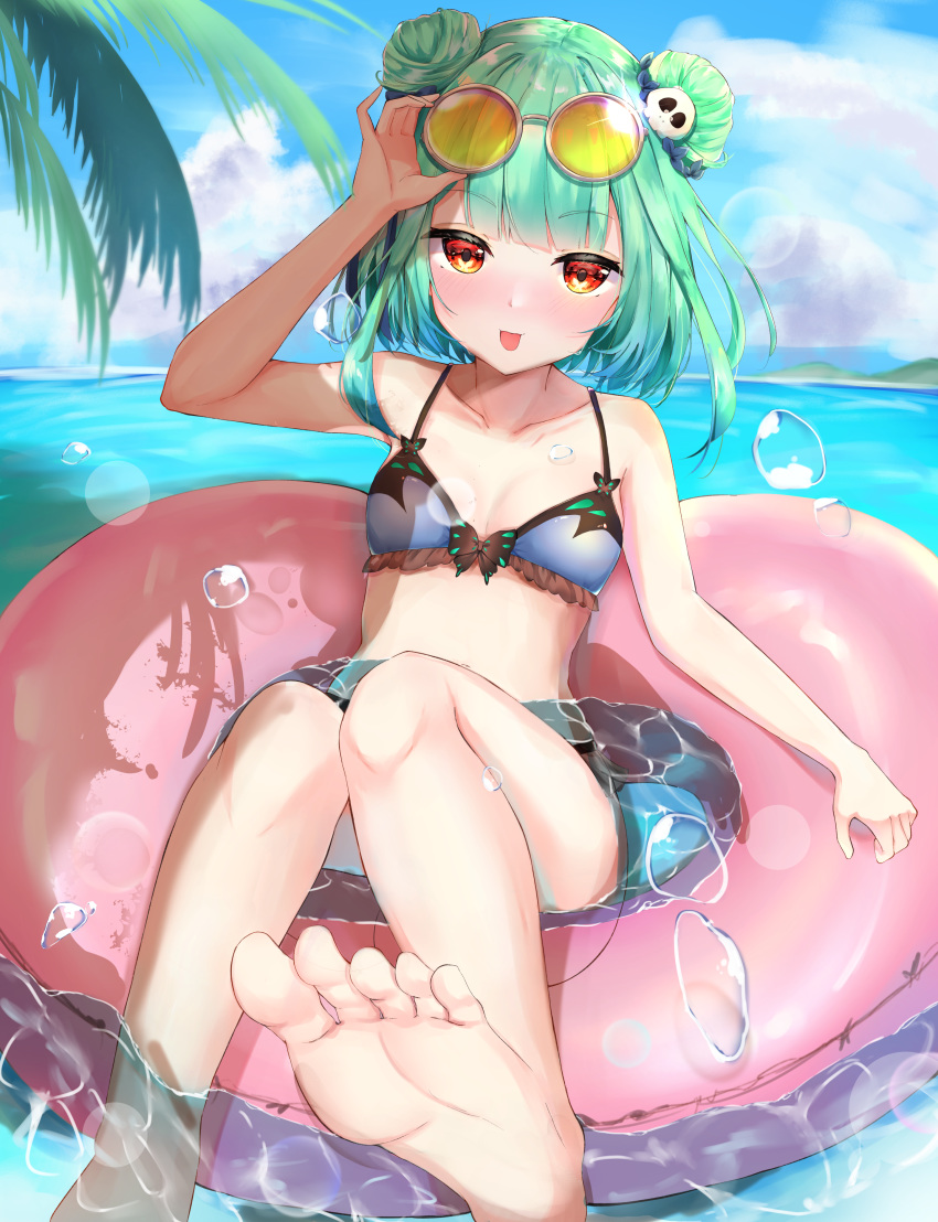 1girl absurdres bangs bare_shoulders barefoot bikini blush breasts double_bun feet glasses green_hair hair_ornament highres hololive kanno_esuto long_hair looking_at_viewer navel open_mouth red_eyes short_hair skull_hair_ornament smile soles solo swimsuit toes uruha_rushia virtual_youtuber