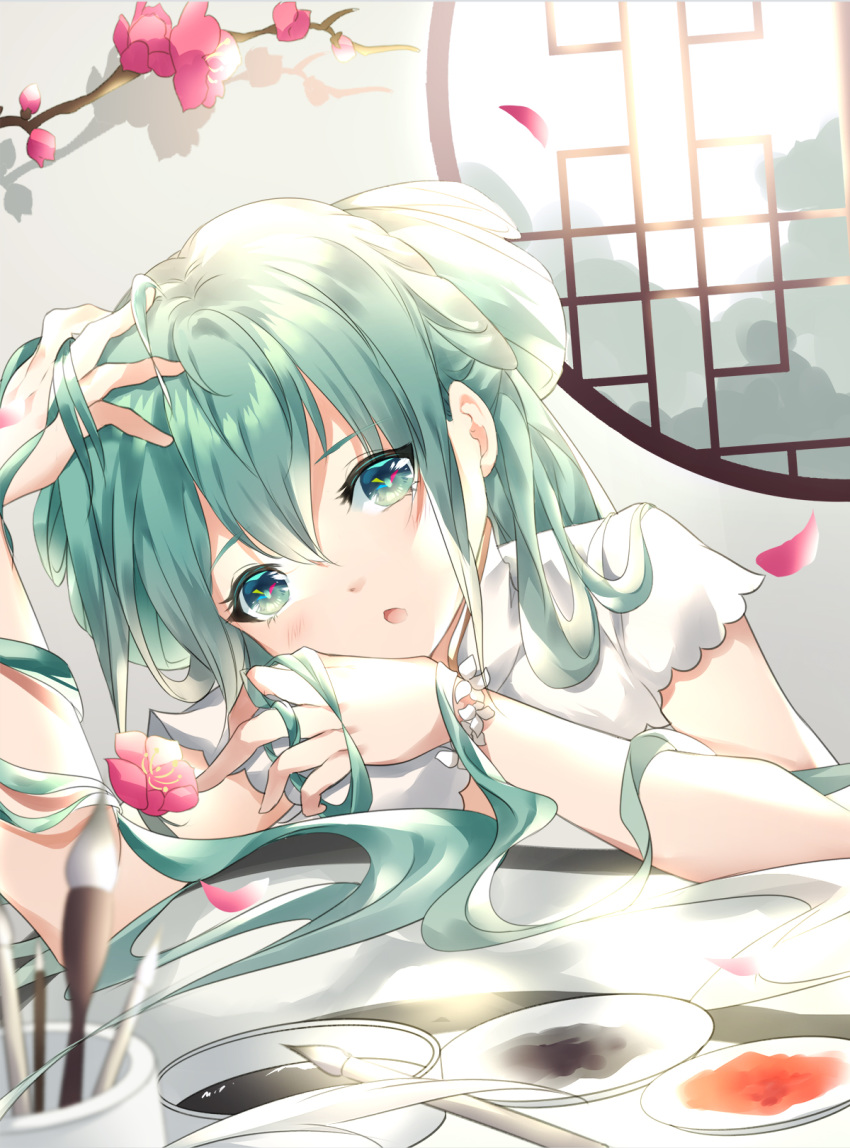 1girl arm_up blush commentary_request day flower flower_bracelet green_eyes green_hair hand_up hatsune_miku highres indoors long_hair looking_at_viewer paintbrush parted_lips petals red_flower rhea_(0u0) round_window shirt short_sleeves solo sunlight tree_branch upper_body vocaloid white_flower white_shirt window