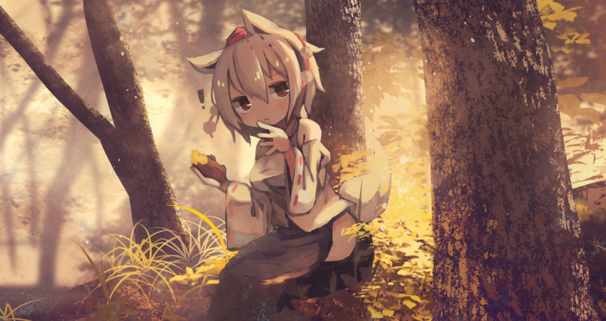 ! 1girl animal_ears blurry blush commentary depth_of_field eating food forest grass hakama hand_up hat inubashiri_momiji japanese_clothes looking_to_the_side muted_color nature red_eyes short_hair side_slit silver_hair sitting solo sunlight sweet_potato tail ti_owo tokin_hat touhou tree wolf_ears wolf_tail yakiimo