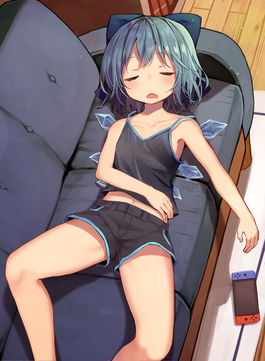 1girl absurdres alternate_costume bare_arms bare_legs bare_shoulders black_shorts blue_bow blue_hair bow camisole cirno closed_eyes collarbone contemporary couch drooling from_above hair_bow highres ice ice_wings indoors lying mamemochi midriff navel nintendo_switch on_back open_mouth short_hair shorts sleeping solo touhou wings wooden_floor