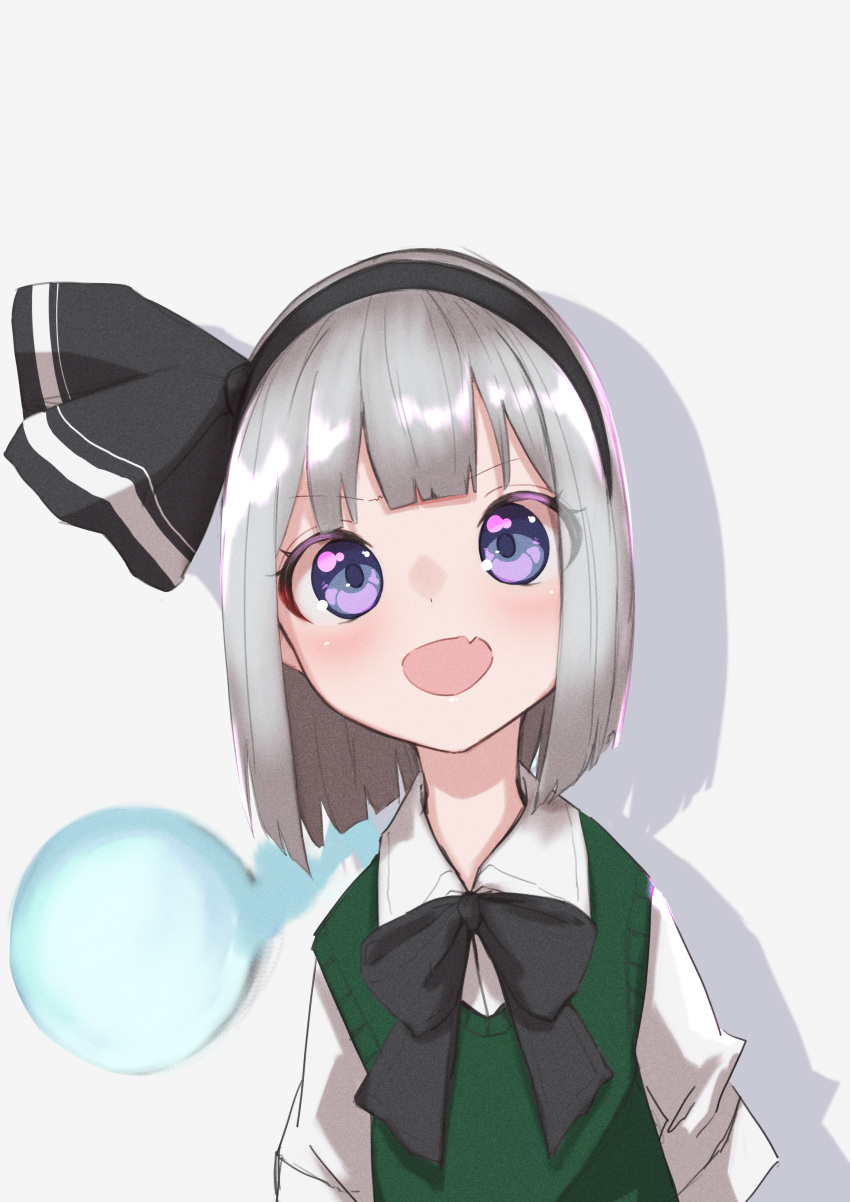 absurdres bangs black_hairband black_neckwear black_ribbon blunt_bangs blush bow bowtie drop_shadow fang green_vest grey_background grey_hair hair_ribbon hairband highres jnakamura1182 konpaku_youmu konpaku_youmu_(ghost) looking_at_viewer medium_hair open_mouth ribbon shirt skin_fang smile touhou upper_body vest violet_eyes white_shirt younger