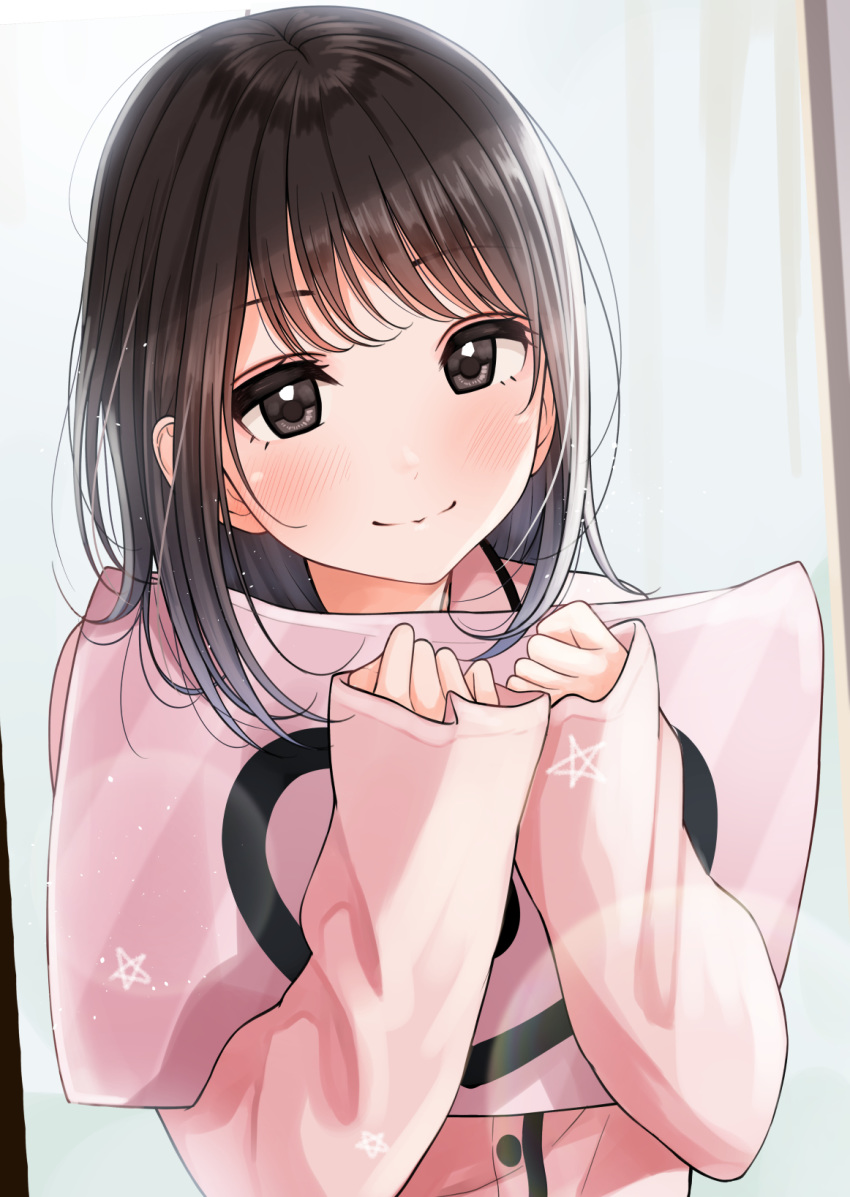 1girl bangs black_hair brown_eyes closed_mouth commentary_request curtains eyebrows_visible_through_hair hands_up highres holding holding_pillow kentaurosu long_hair long_sleeves looking_at_viewer original pillow pink_shirt shirt sleeves_past_wrists smile solo star_(symbol) upper_body