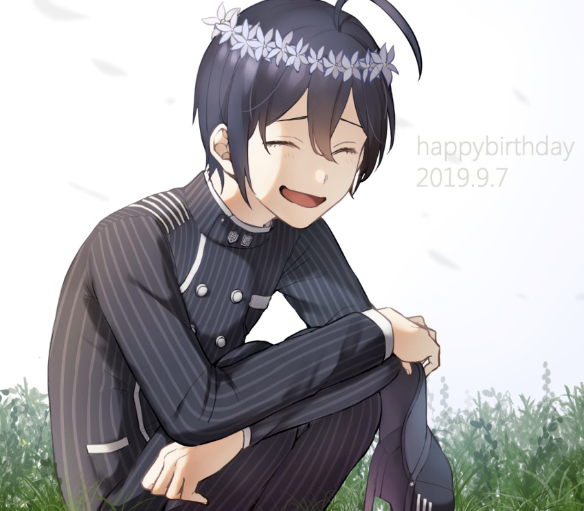 1boy ahoge bangs black_hair black_pants closed_eyes commentary_request dangan_ronpa eyebrows_visible_through_hair flower grass hair_between_eyes happy_birthday hat hat_removed head_wreath headwear_removed highres holding holding_clothes holding_hat long_sleeves male_focus new_dangan_ronpa_v3 open_mouth pants plant saihara_shuuichi simple_background sitting smile solo zabe_o