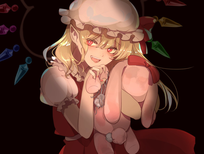 1girl bangs beige_headwear beige_shirt black_background blonde_hair blush bow bright_pupils collared_shirt commentary_request crystal damaged dark eyebrows_visible_through_hair eyelashes fang flandre_scarlet frilled_hat frilled_shirt_collar frilled_sleeves frills hand_up hat hat_bow hat_ribbon highres holding holding_stuffed_toy joniko1110 long_hair mob_cap nail_polish one_side_up open_mouth pointy_ears puffy_short_sleeves puffy_sleeves red_bow red_eyes red_nails red_ribbon red_skirt red_vest ribbon shirt short_sleeves sidelocks simple_background skirt skirt_set solo stuffed_animal stuffed_bunny stuffed_toy stuffing thread touhou vest white_pupils white_shirt wings