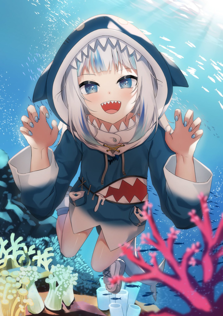 1girl :d animal_hood atora bangs blue_eyes blue_hair blue_hoodie blue_nails blurry blurry_foreground claw_pose commentary_request coral day depth_of_field drawstring gawr_gura hands_up highres hololive hololive_english hood hood_up hoodie long_sleeves looking_at_viewer multicolored_hair nail_polish ocean open_mouth outdoors shark_hood sharp_teeth shoes smile solo streaked_hair teeth underwater virtual_youtuber water white_footwear white_hair wide_sleeves
