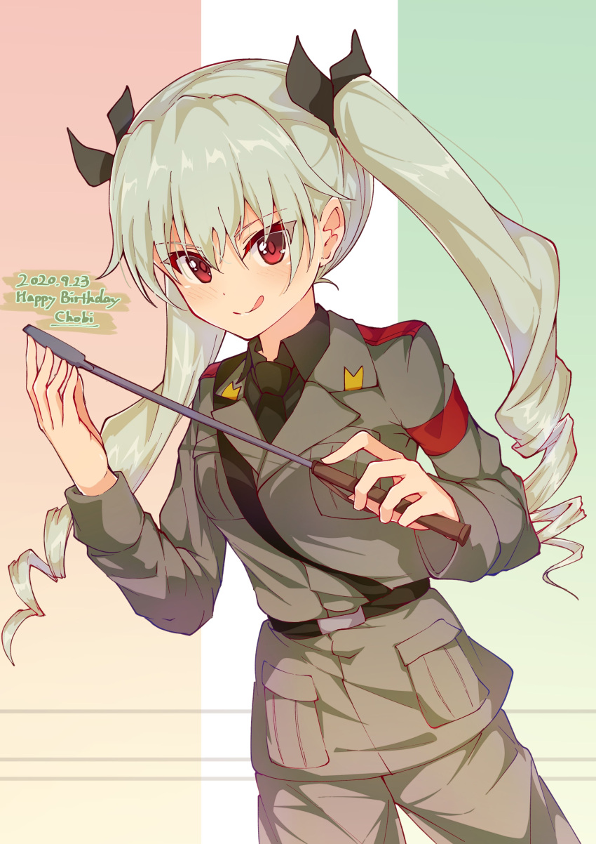 1girl :q absurdres anchovy_(girls_und_panzer) anzio_military_uniform bangs belt black_belt black_neckwear black_ribbon black_shirt character_name closed_mouth commentary cowboy_shot dated dress_shirt drill_hair dutch_angle english_text eyebrows_visible_through_hair flag_background girls_und_panzer green_hair grey_jacket grey_pants hair_ribbon happy_birthday highres holding italian_flag jacket long_hair long_sleeves looking_at_viewer military military_uniform necktie pants pizza_(artist) red_eyes ribbon riding_crop sam_browne_belt shirt smile solo tongue tongue_out twin_drills twintails uniform wing_collar