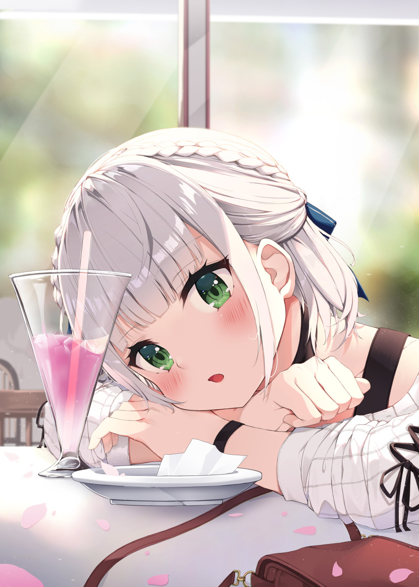 1girl :o absurdres arm_pillow bag bangs black_choker blue_ribbon blush braid cherry_blossoms choker commentary day drinking_straw eyebrows_visible_through_hair french_braid glass green_eyes hair_ribbon handbag highres hololive indoors keis_(locrian1357) looking_at_viewer open_mouth ribbed_sweater ribbon shirogane_noel short_hair sidelocks silver_hair sitting solo sunlight sweater upper_body virtual_youtuber white_sweater wristband