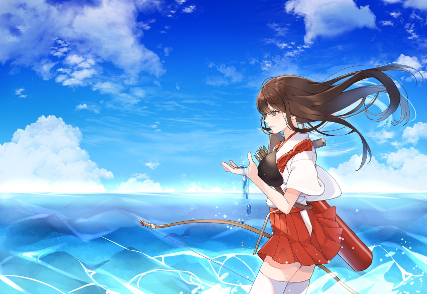 1girl akagi_(kantai_collection) arrow_(projectile) bangs bow_(weapon) brown_eyes brown_hair closed_mouth clouds day eyebrows_visible_through_hair from_side hakama hakama_skirt highres holding holding_bow_(weapon) holding_weapon japanese_clothes kantai_collection kozu_(bloomme1_me) long_hair muneate ocean outdoors profile quiver red_hakama sky solo tasuki thigh-highs water weapon white_legwear wind