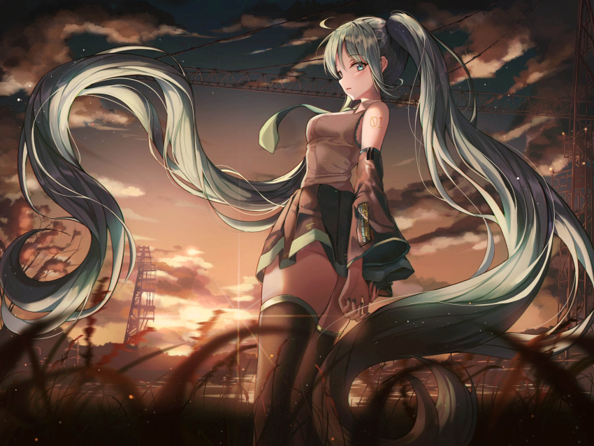 1girl ahoge aqua_eyes aqua_hair aqua_neckwear arms_behind_back bare_shoulders blurry_foreground breasts clouds dawn detached_sleeves facing_away grass hair_blowing hatsune_miku highres icebox46 light_particles long_hair looking_at_viewer looking_back medium_breasts necktie number_tattoo outdoors parted_lips scenery shirt sidelocks skirt sky solo standing sunrise tattoo thigh-highs thighs twintails very_long_hair vocaloid
