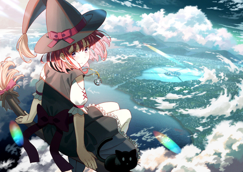 1girl back bangs black_cat black_dress broom broom_riding cat cityscape clouds day dress eyebrows_visible_through_hair hat headwear highres jewelry koh_rd looking_at_viewer medium_hair original pendant pink_hair ribbon scenery short_sleeves sitting sky solo water witch witch_hat