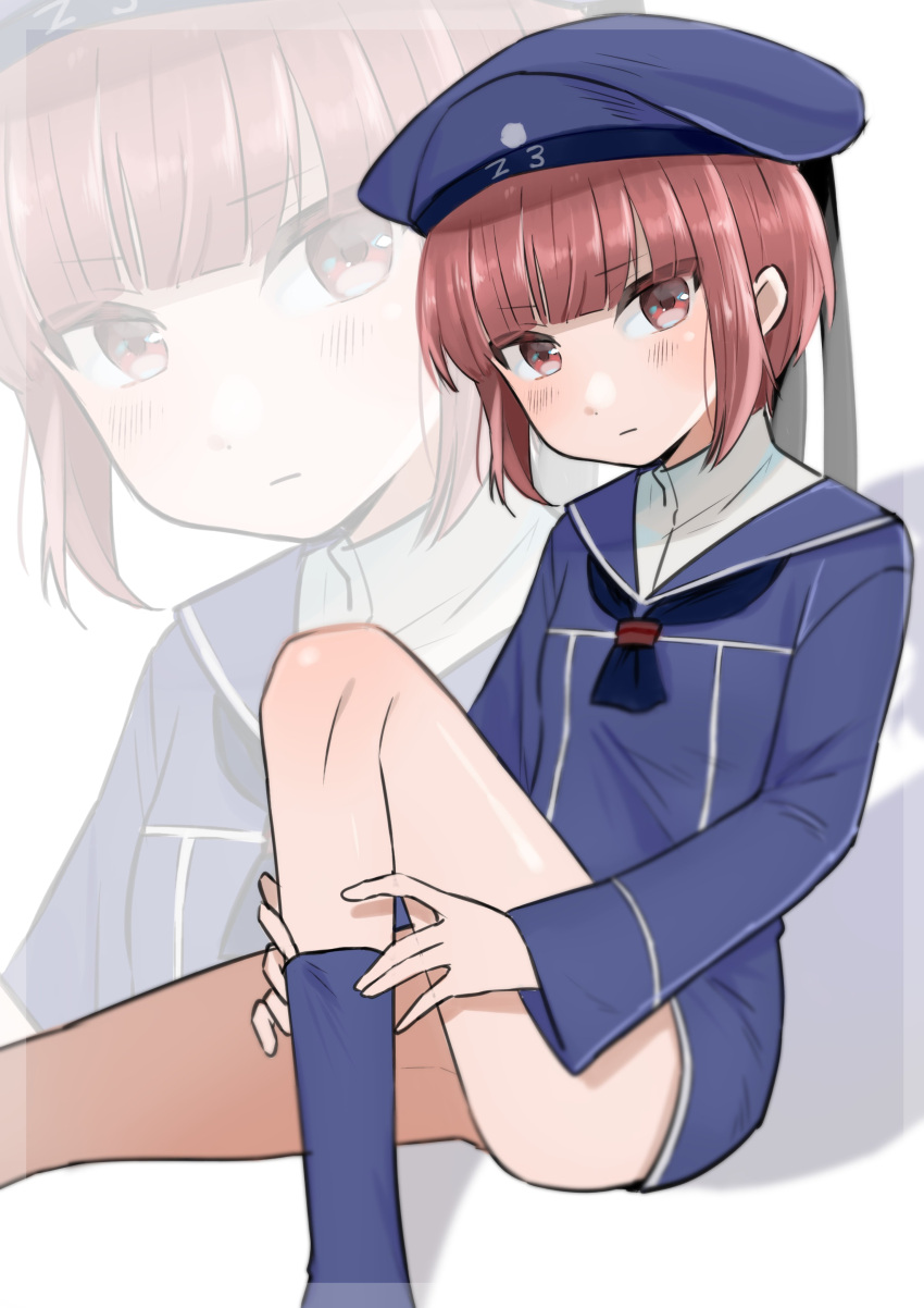 1girl absurdres blue_dress blue_headwear blue_legwear blue_sailor_collar brown_eyes brown_hair clothes_writing commentary_request dress hat highres kantai_collection looking_at_viewer sailor_collar sailor_dress sailor_hat short_hair simple_background sitting socks solo toriniku_senshi_chikinman white_background z3_max_schultz_(kantai_collection) zoom_layer