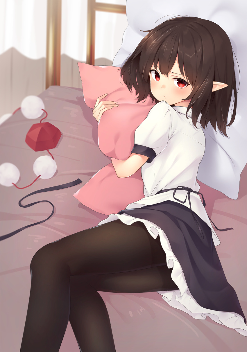 1girl :/ bed black_hair black_legwear black_skirt blush commentary curtains feet_out_of_frame hat hat_removed headwear_removed highres kanpa_(campagne_9) looking_at_viewer lying on_bed on_side pantyhose petticoat pillow pillow_hug pointy_ears pom_pom_(clothes) puffy_short_sleeves puffy_sleeves red_eyes red_headwear shameimaru_aya shirt short_hair short_sleeves skirt solo thighband_pantyhose tokin_hat touhou uneven_eyes untucked_shirt white_shirt