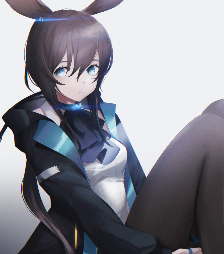 1girl absurdres amiya_(arknights) animal_ears arknights black_jacket black_neckwear blue_eyes brown_hair brown_legwear closed_mouth cravat earrings from_side glint gradient gradient_background grey_background hair_between_eyes highres hood hood_down hooded_jacket jacket jewelry leg_hug long_hair long_sleeves looking_at_viewer looking_to_the_side migihidari_(puwako) open_clothes open_jacket pantyhose rabbit_ears red_pupils ring shirt sitting solo very_long_hair white_shirt