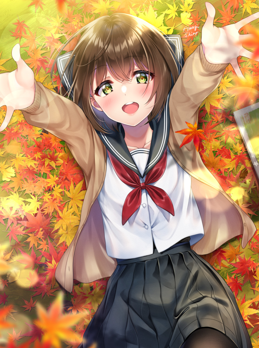 1girl amagi_shino autumn autumn_leaves bangs beige_cardigan black_legwear black_skirt blurry_foreground brown_hair cardigan green_eyes hair_between_eyes highres leaf looking_at_viewer lying maple_leaf neckerchief on_back open_cardigan open_clothes open_mouth original outstretched_arms outstretched_hand pantyhose pleated_skirt red_neckwear sailor_collar school_uniform serafuku shirt short_hair signature sketchbook skirt smile solo white_shirt